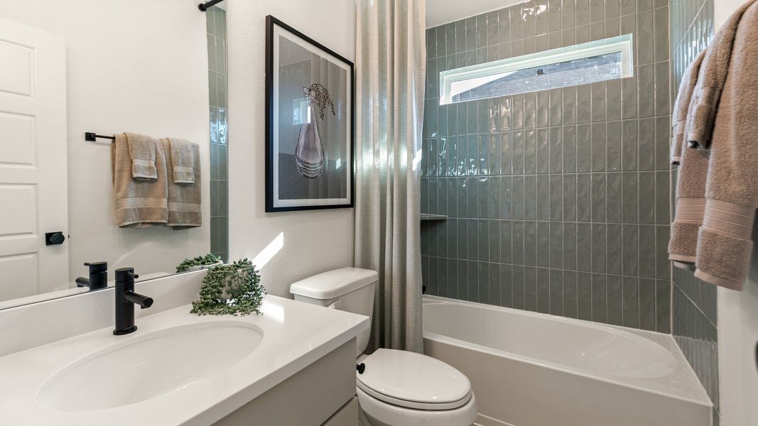 Representative furnished interior of a home built from the Rosewood by DRB Homes in Brookewater, Rosenberg (Image 26).