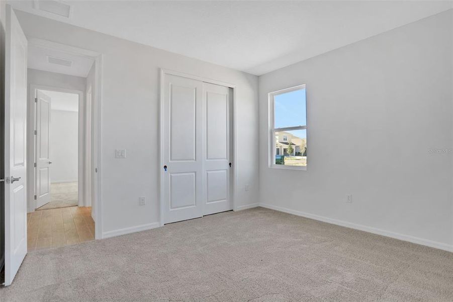 Spacious, unfurnished interior of a new home in Angeline, Land O' Lakes (Image 28).