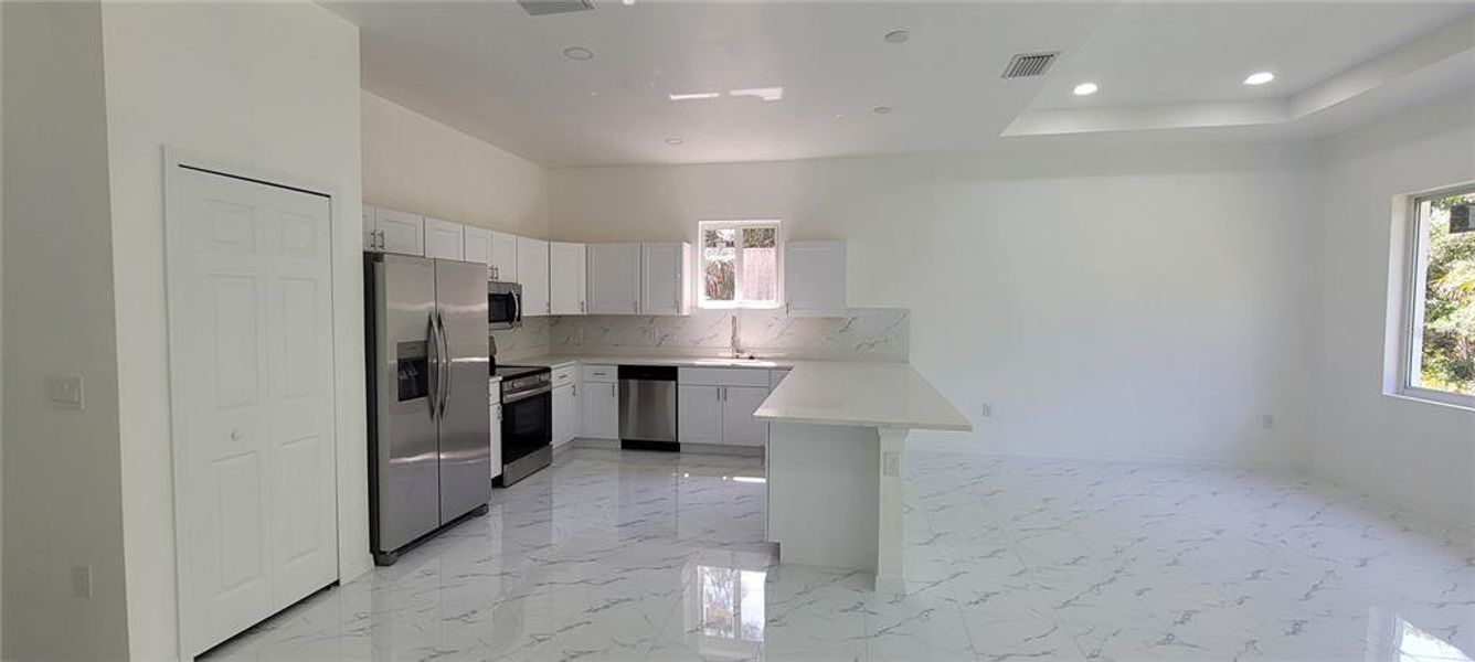 Furnished interior view inside a new home in , Punta Gorda (Image 5). Furnished interior view inside a new home in , Punta Gorda (Image 5).