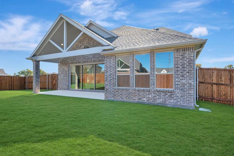 Exterior details and patio area of a home in Kreymer at the Park, Wylie (Image 23). Exterior details and patio area of a home in Kreymer at the Park, Wylie (Image 23).