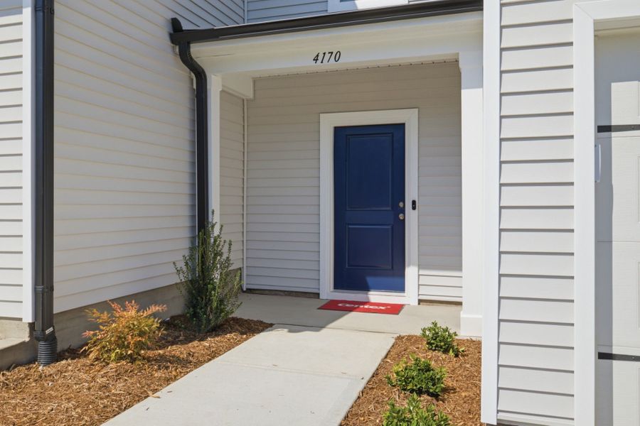 Exterior details and patio area of a home in Carpenter Falls, Durham (Image 4). Exterior details and patio area of a home in Carpenter Falls, Durham (Image 4).