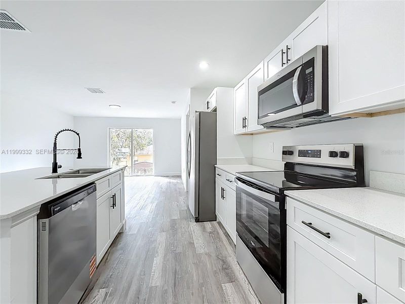 Furnished interior view inside a new home in , Ocala (Image 4).
