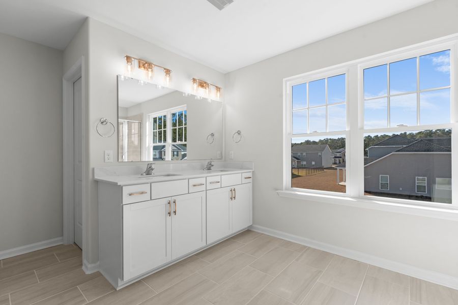 Furnished interior view inside a new home in McAllister Pointe, Richmond Hill (Image 7).