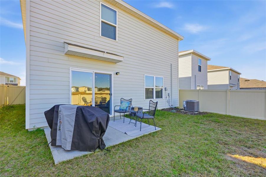 Exterior details and patio area of a home in Avalon Woods, Newberry (Image 4).