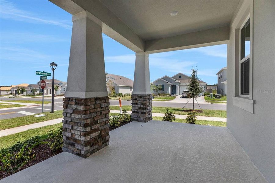 Exterior details and patio area of a home in Crossroads at Kelly Park, Apopka (Image 35).
