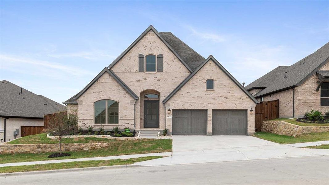 View of front of home with a garage