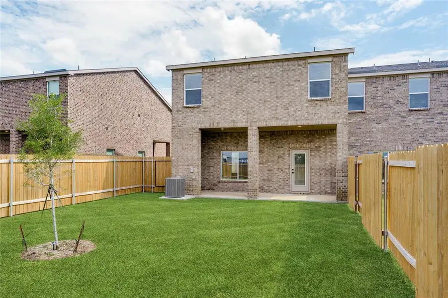 This is an example of the backyard at 437 MB's Way. The backyard is fenced, landscaped, and has a covered concrete patio. This is an example of the backyard at 437 MB's Way. The backyard is fenced, landscaped, and has a covered concrete patio.