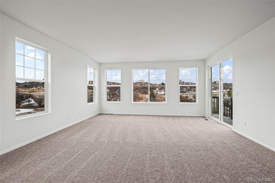 Spacious, unfurnished interior of a new home in Terrain Oak Valley, Castle Rock (Image 7).