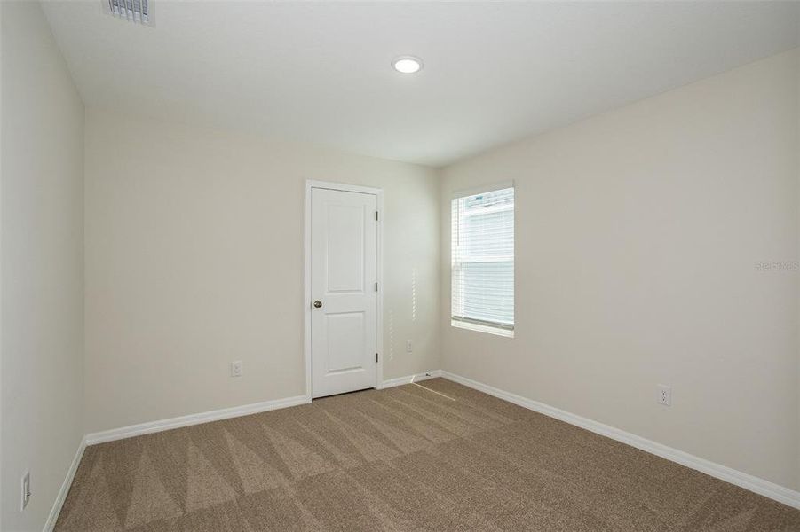 Spacious, unfurnished interior of a new home in Pasadena Ridge, Dade City (Image 12).