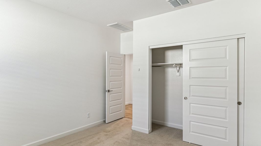 Representative unfurnished interior of a home built from the Cobalt by D.R. Horton in The Ridge at Stone Butte, Phoenix (Image 16).