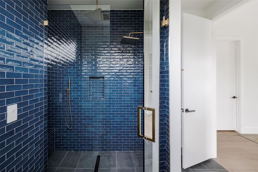 Full bathroom featuring a stall shower