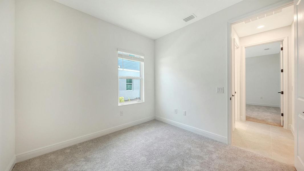 Spacious, unfurnished interior of a new home in Palmera Real Estate and Homes for Sale in Venice, FL - Neal Communities, Venice (Image 39). Spacious, unfurnished interior of a new home in Palmera Real Estate and Homes for Sale in Venice, FL - Neal Communities, Venice (Image 39).