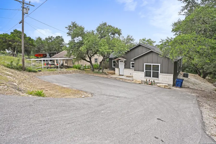 Front exterior of a new home in , Canyon Lake, TX, highlighting curb appeal (Image 2). Front exterior of a new home in , Canyon Lake, TX, highlighting curb appeal (Image 2).