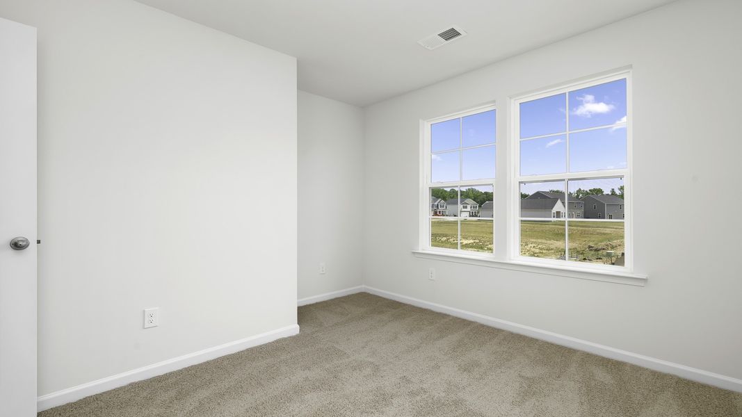 Representative unfurnished interior of a home built from the Denver by D.R. Horton in The Gables at Edinborough Townes, Gibsonville (Image 13).