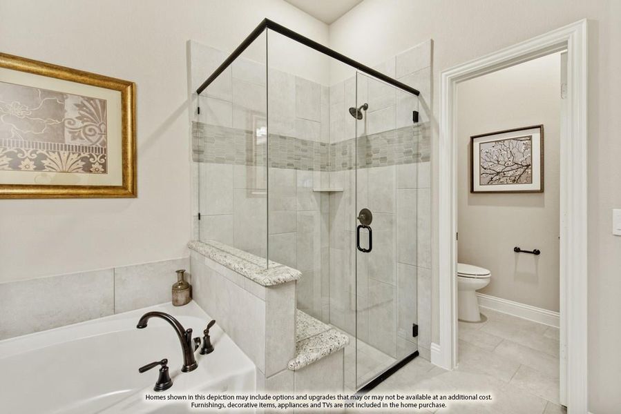 Bathroom with glass walk-in shower, built-in bench, soaking tub, and separate water closet with toilet
