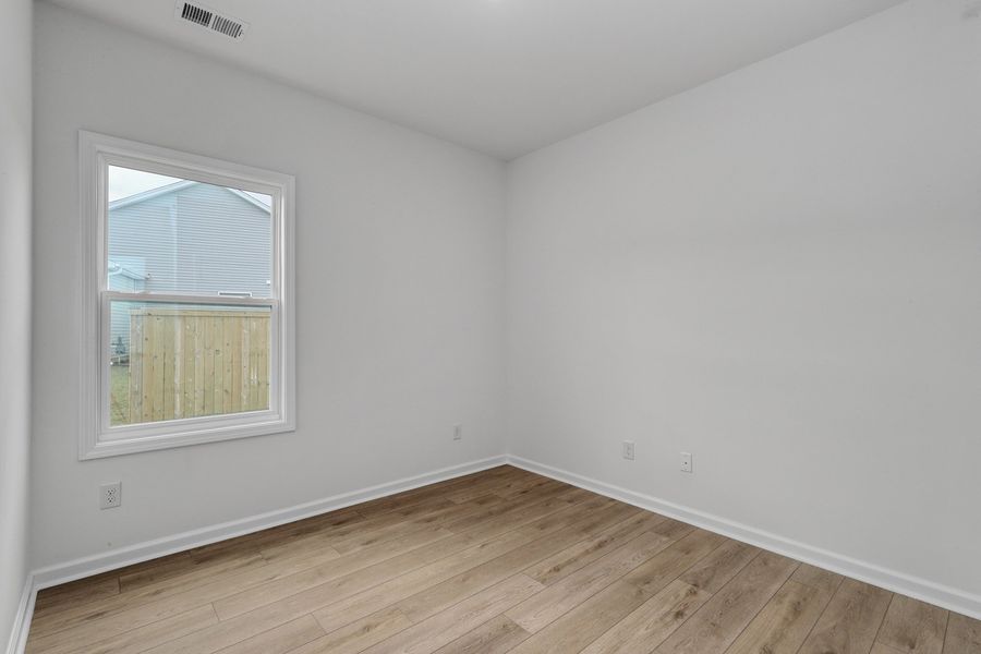 Spacious, unfurnished interior of a new home in Garden Grove, Conway (Image 28).