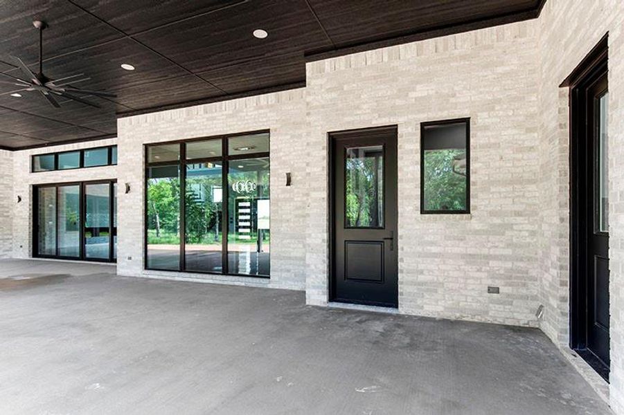 Exterior details and patio area of a home in , Sadler (Image 21).