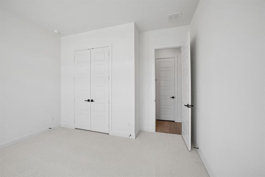 Spacious, unfurnished interior of a new home in Pecan Square - Gardens, Northlake (Image 20). Spacious, unfurnished interior of a new home in Pecan Square - Gardens, Northlake (Image 20).