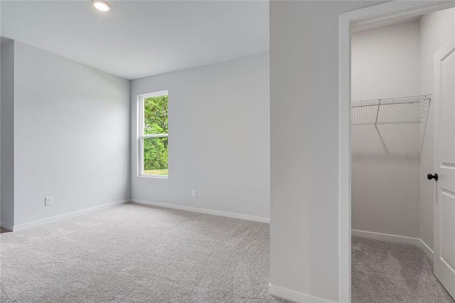 Spacious, unfurnished interior of a new home in Windsong Estates, McDonough (Image 7).