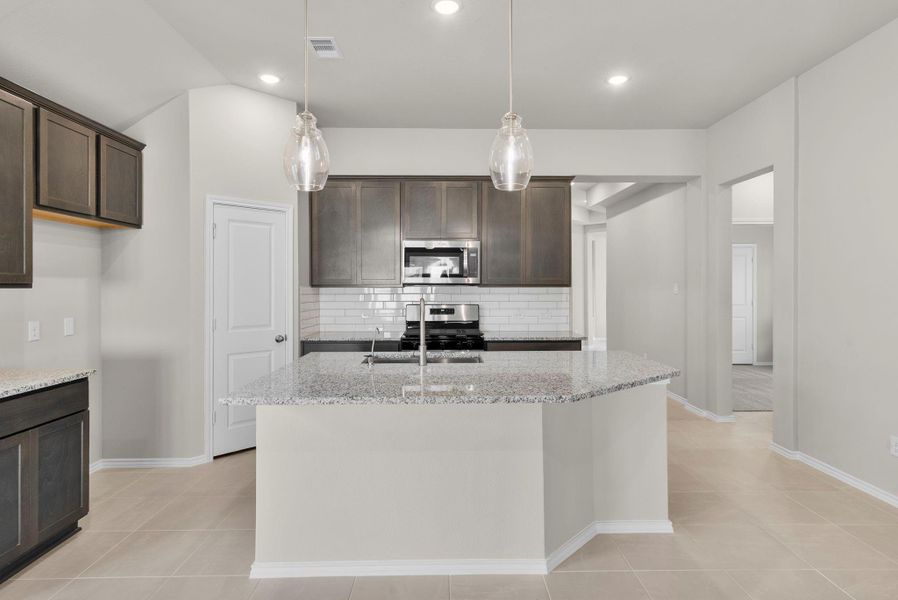 Furnished interior view inside a new home in Grand Central Park, Conroe (Image 6).