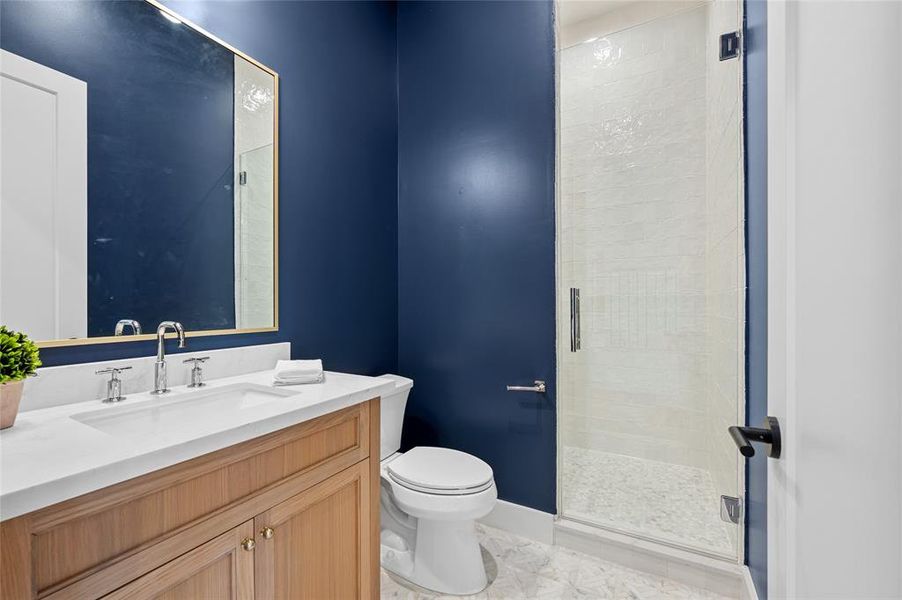 Full bath on first floor with white oak vanity