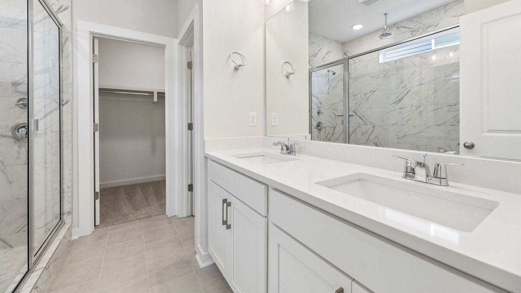 Primary bathroom with dual vanity