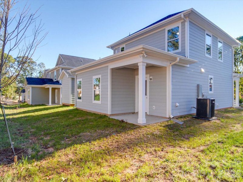 Exterior details and patio area of a home in , Belmont (Image 22).