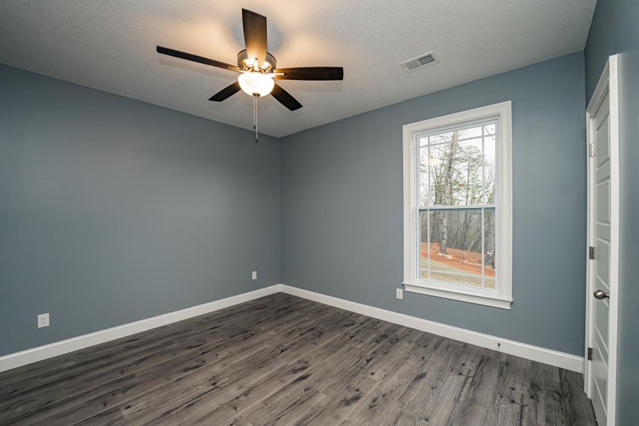 Representative unfurnished interior of a home built from the Roosevelt Elite by Enchanted Homes in Pointe Summit, Slater-Marietta (Image 20).
