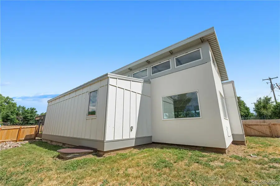 Front exterior of a new home in , Aurora, CO, highlighting curb appeal (Image 15).