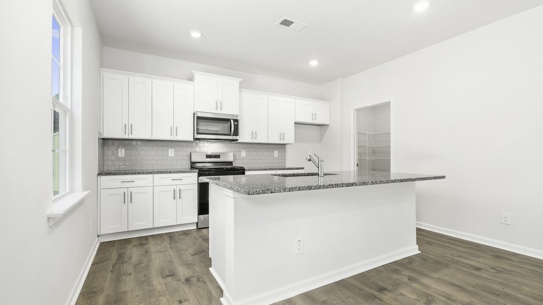 Representative furnished interior of a home built from the Galen by D.R. Horton in Forest Creek, Winston-Salem (Image 5).