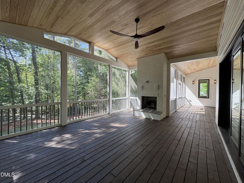 Screen porch living area with Firplace