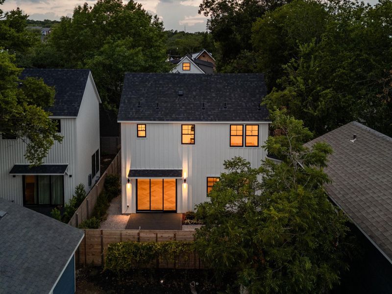 Rear view of property with roof with shingles Rear view of property with roof with shingles
