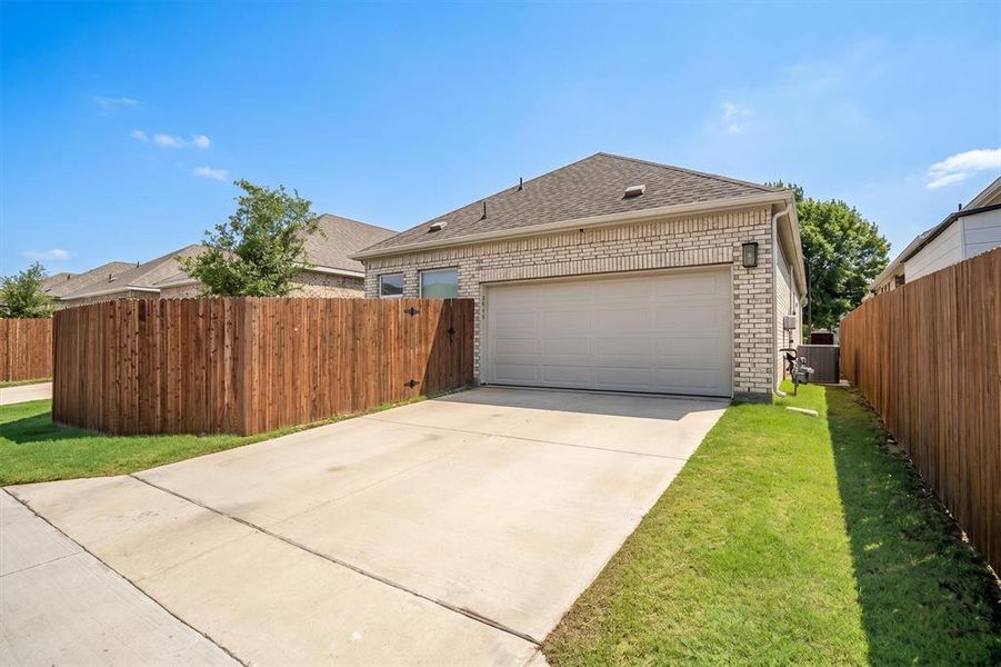 Front exterior of a new home in , Garland, TX, highlighting curb appeal (Image 25).