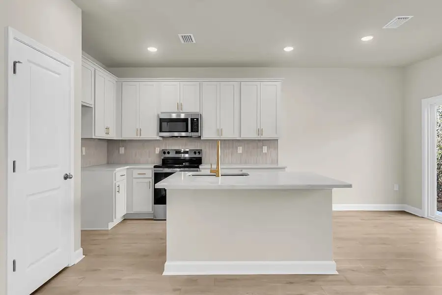 Furnished interior view inside a new home in Windward Village, Summerville (Image 4).