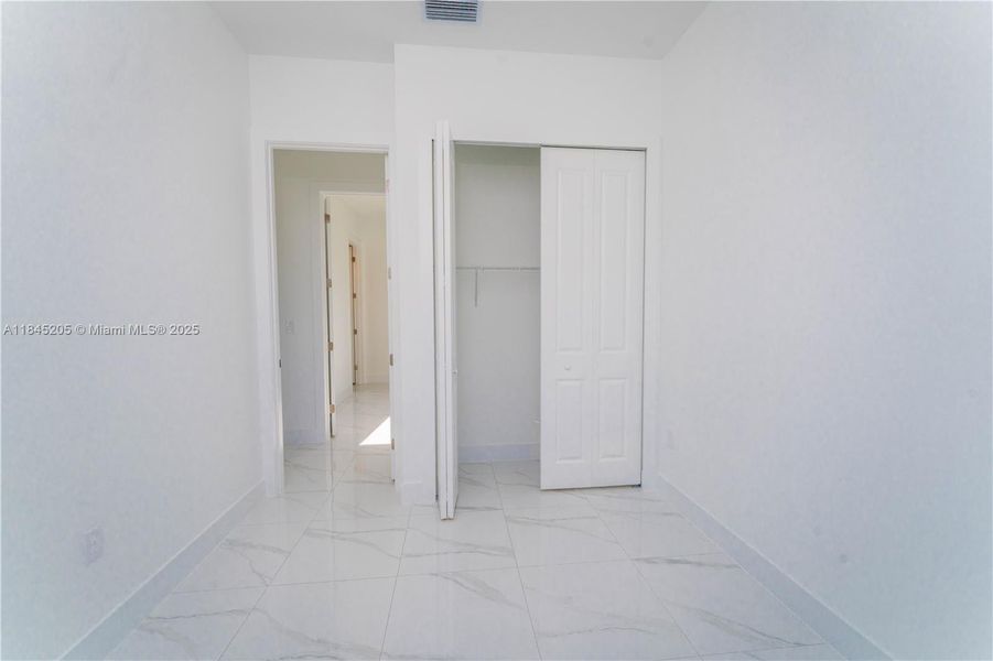 Spacious, unfurnished interior of a new home in , Lehigh Acres (Image 12). Spacious, unfurnished interior of a new home in , Lehigh Acres (Image 12).