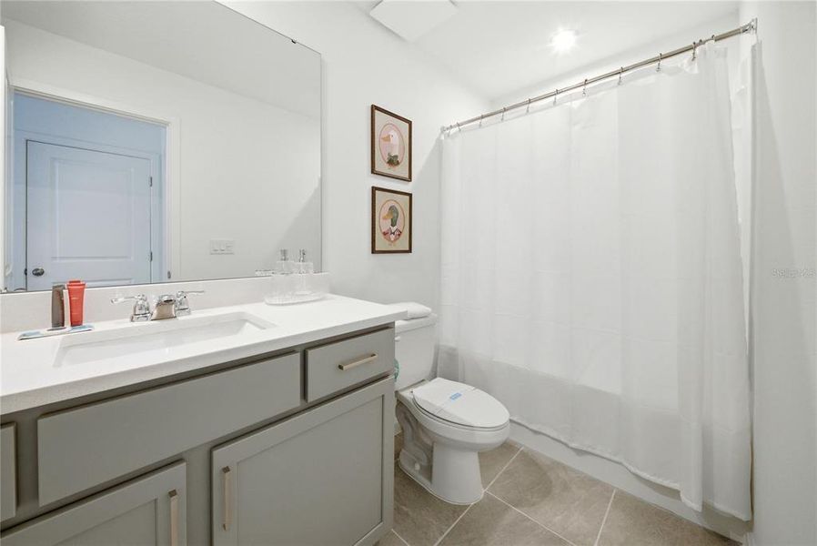 Furnished interior view inside a new home in Solara Resort, Kissimmee (Image 27).