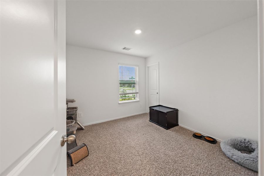 Spacious, unfurnished interior of a new home in The Canopies, Splendora (Image 18).