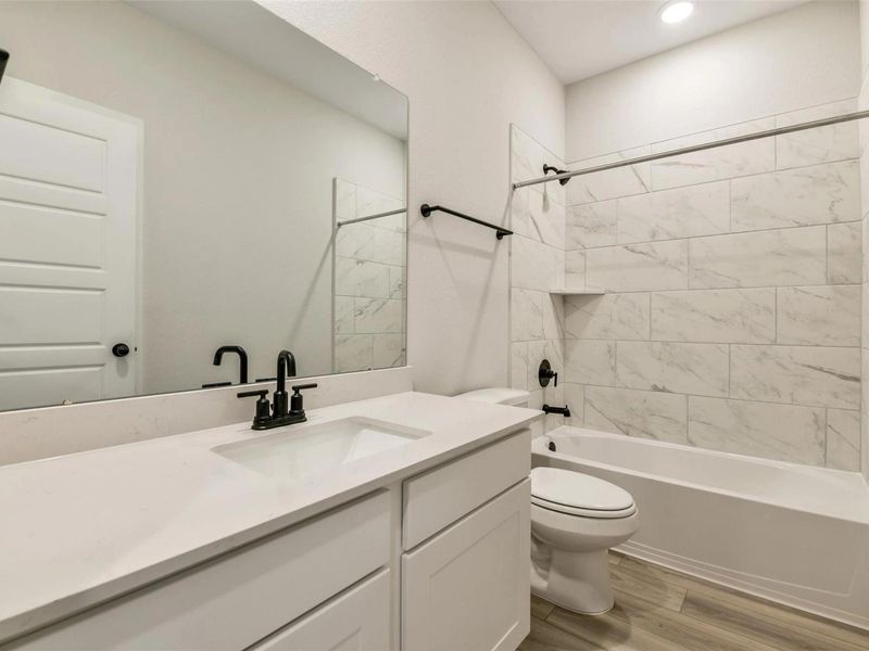 Furnished interior view inside a new home in Sundance Cove, Crosby (Image 12).