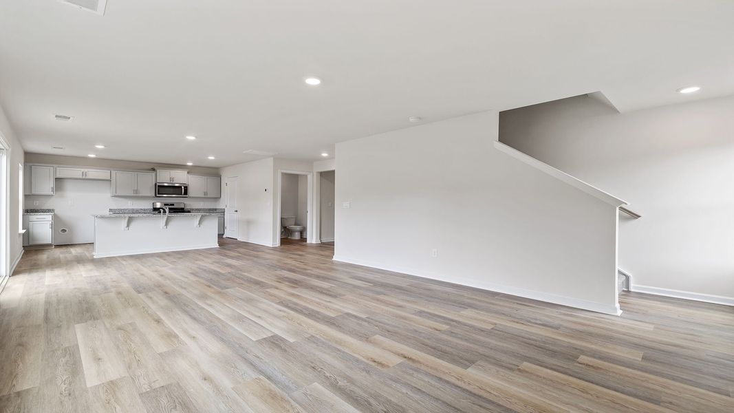 Spacious, unfurnished interior of a new home in Bentley Park, Greenwood (Image 19).