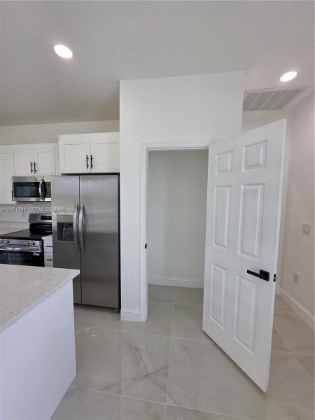 Furnished interior view inside a new home in , Lehigh Acres (Image 7).