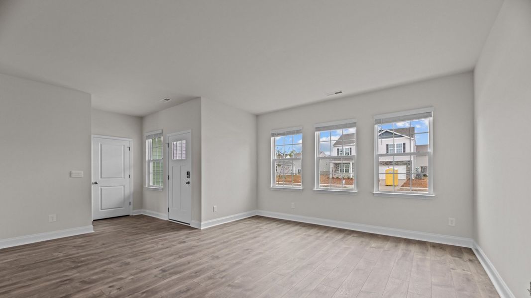 Representative unfurnished interior of a home built from the Mills by D.R. Horton in Tyler - Home on the Lake, New Bern (Image 7).