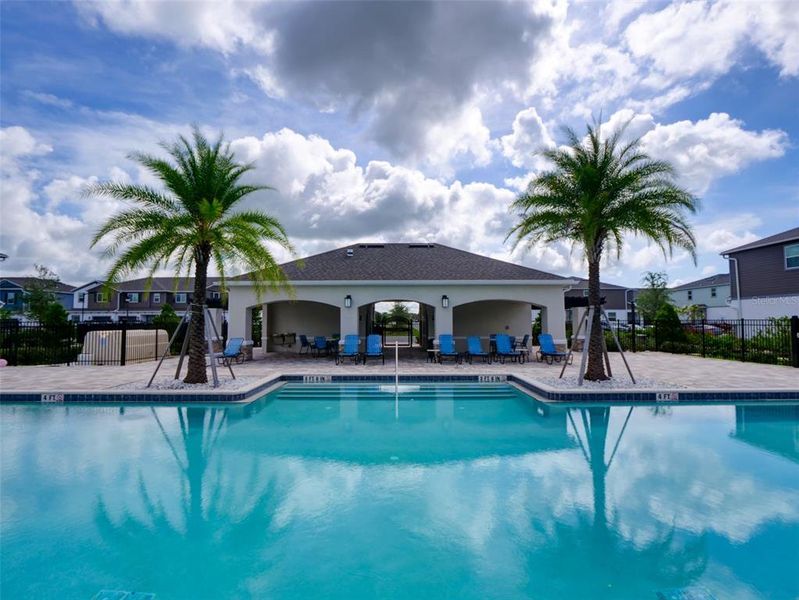 Front exterior of a new home in , Orlando, FL, highlighting curb appeal (Image 21).