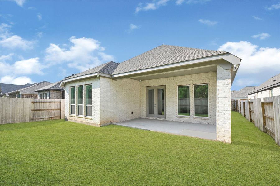 Front exterior of a new home in Grand Central Park 45', Conroe, TX, highlighting curb appeal (Image 18). Front exterior of a new home in Grand Central Park 45', Conroe, TX, highlighting curb appeal (Image 18).