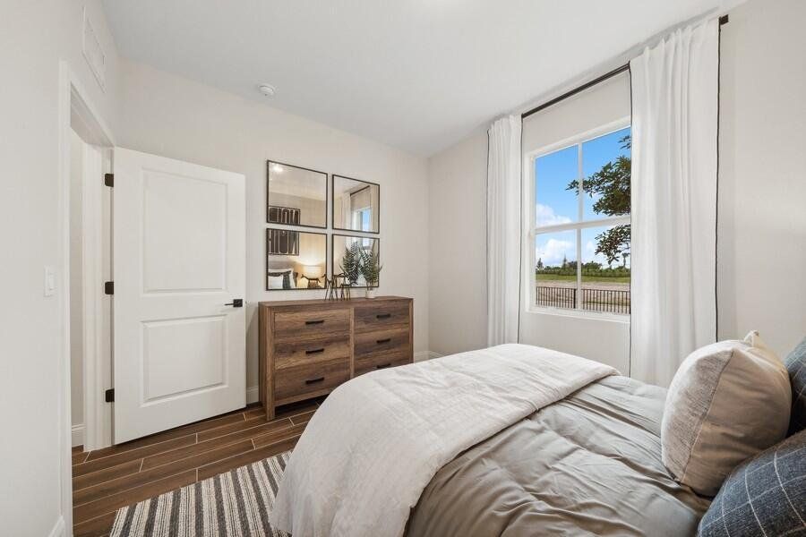 Furnished interior view inside a new home in , Port St. Lucie (Image 35).