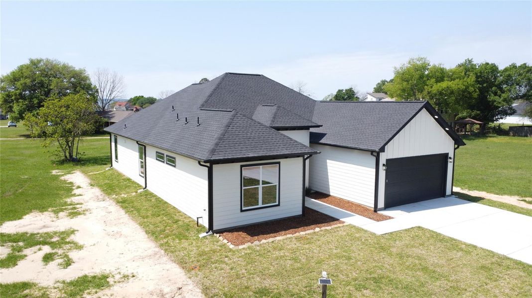 Front exterior of a new home in , Livingston, TX, highlighting curb appeal (Image 23). Front exterior of a new home in , Livingston, TX, highlighting curb appeal (Image 23).