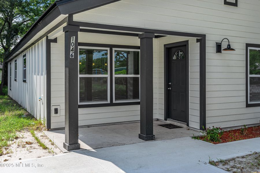 Front exterior of a new home in , Jacksonville, FL, highlighting curb appeal (Image 24). Front exterior of a new home in , Jacksonville, FL, highlighting curb appeal (Image 24).