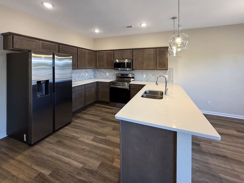 Furnished interior view inside a new home in The Village at Sassafras, Allenhurst (Image 7).