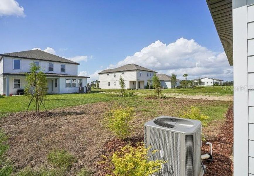 Exterior details and patio area of a home in Trailside, Mount Dora (Image 16). Exterior details and patio area of a home in Trailside, Mount Dora (Image 16).