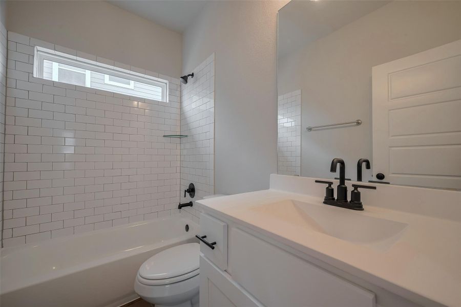 Furnished interior view inside a new home in Woodland Lakes, Huffman (Image 12).