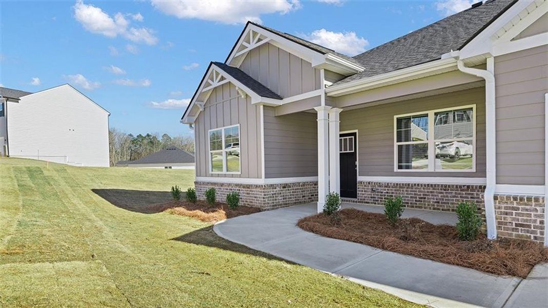 Exterior details and patio area of a home in Kingston Ranch at Lake Oconee, Buckhead (Image 21).